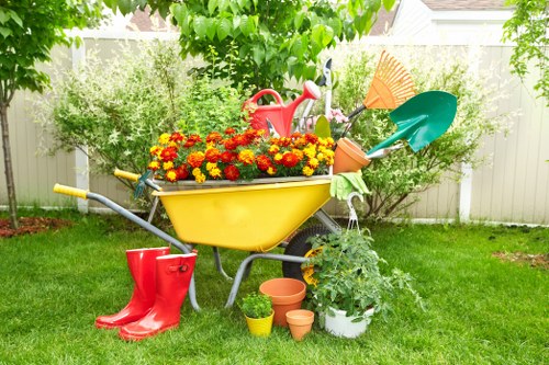 Gardener in Beckenham preparing equipment with safety in mind