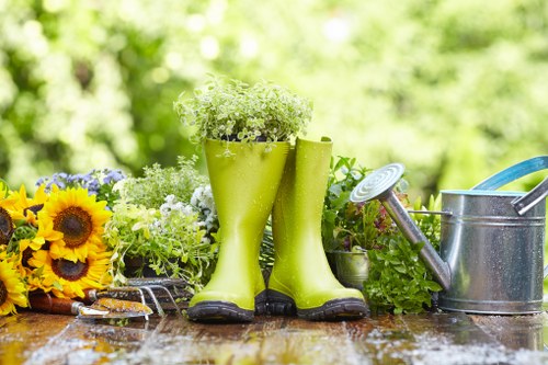 Gardener wearing PPE while carrying out maintenance work